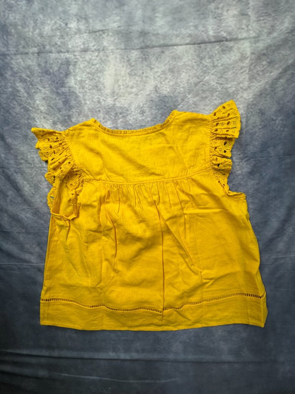Marc New York yellow eyelet blouse features ruffled cap sleeves and a tassel tie - Picture 7 of 8